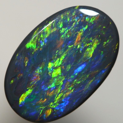 SOLID BLACK OPAL Strong gold copper fire. SEE VIDEO